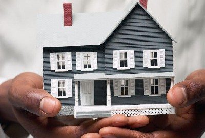 A house held in hands